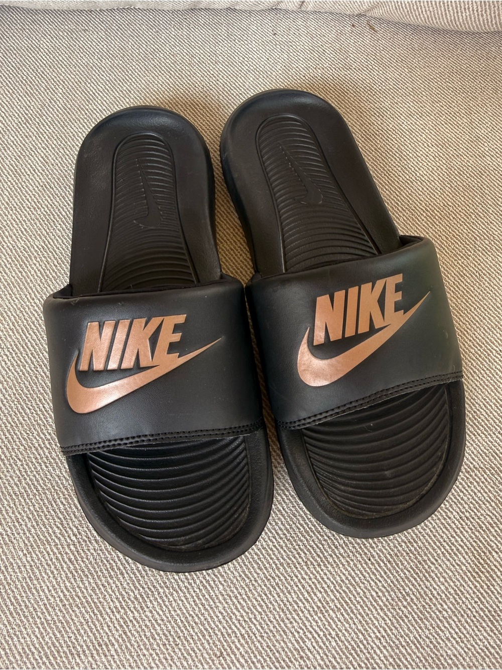 Nike Women’s  Black Slides with Metallic Gold Swoosh